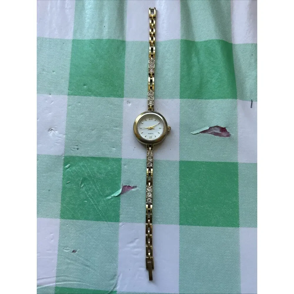Gold Tone Rhinestone Band Women’s Quartz Watch